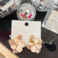 GOLD MOTHER OF PEARL FLORAL STUD EARRINGS