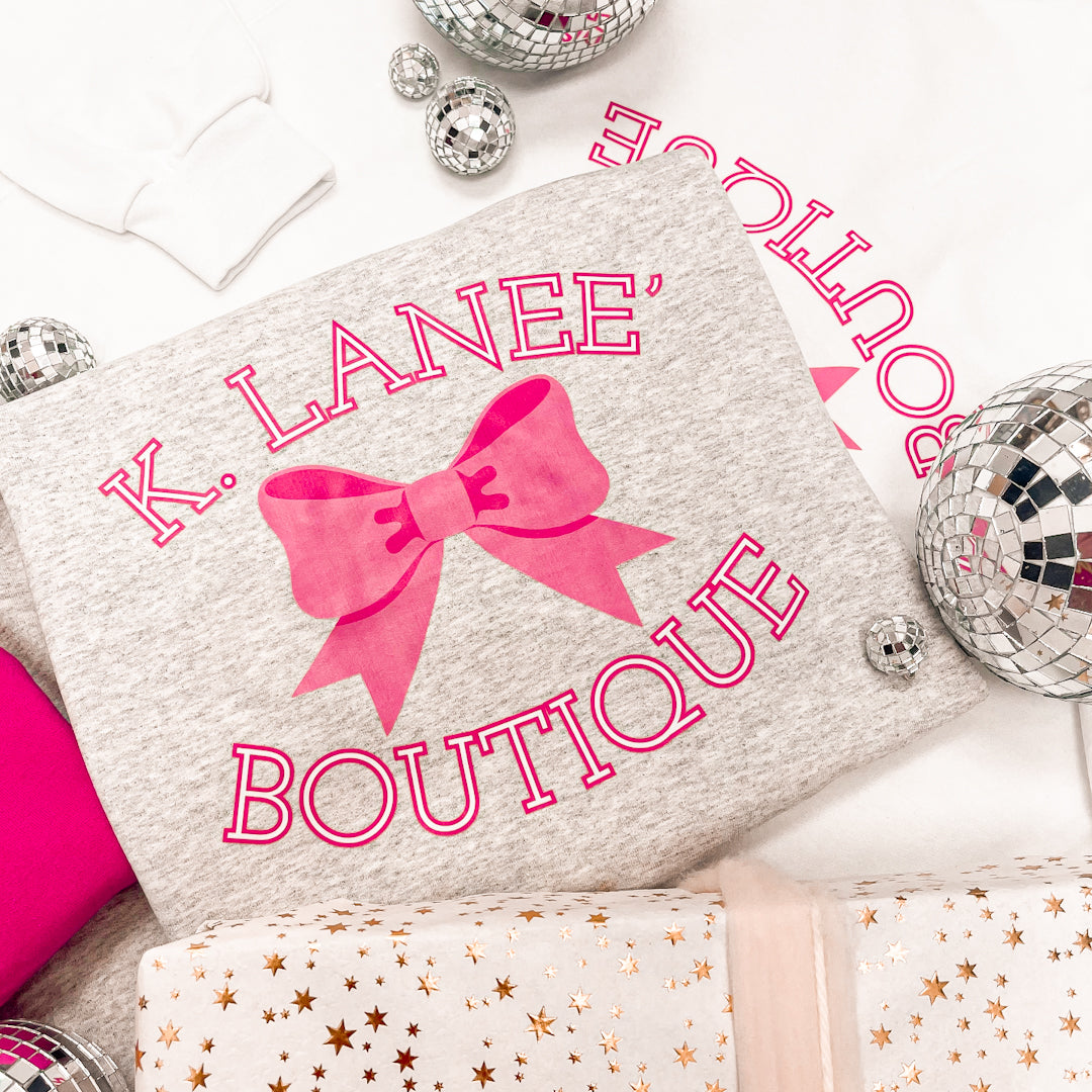 K. LANEE' BOW SWEATSHIRT