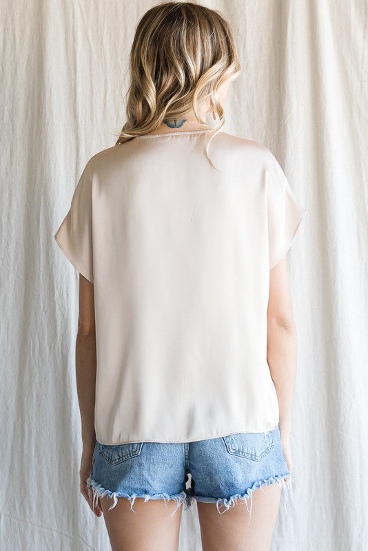 POP THE CHAMPAGNE V-NECK TOP